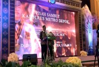 Kombes Pol Abdul Waras bersama istri berpamitan kepada masyarakat Kota Depok dalam acara pisah sambut Kapolres Metro Depok di Hotel Bumi Wiyata Rabu malam (27/07/26). (Foto: Siaran Depok)